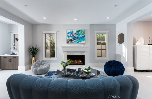 a bedroom with a bed and a fireplace