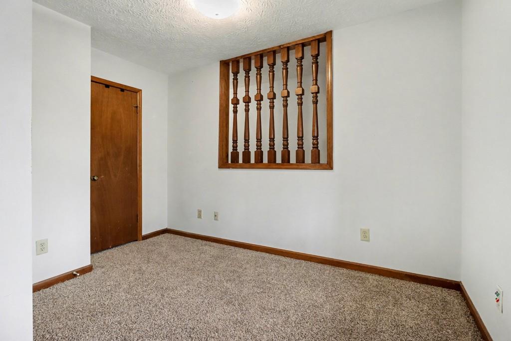 9133 Snipe Lane Jonesboro, GA 30236 - Photo 30 of 36 an empty room with windows