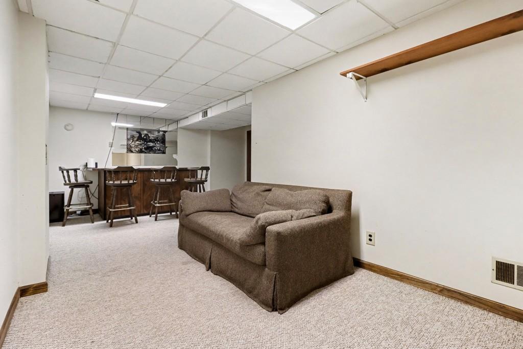 9133 Snipe Lane Jonesboro, GA 30236 - Photo 6 of 36 a living room with furniture and a piano