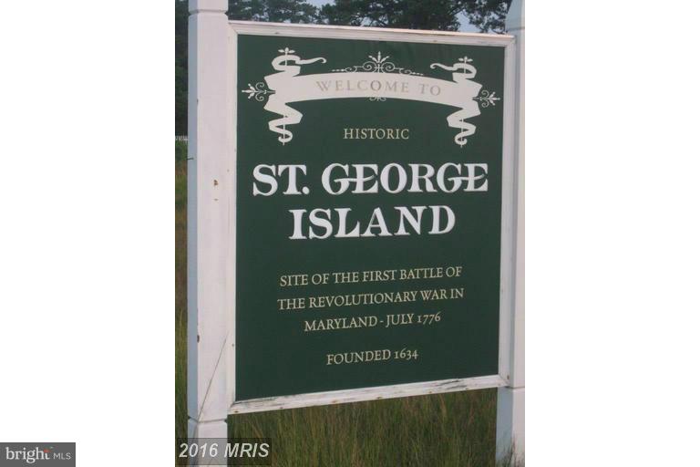 16934 Piney Point Road Piney Point, MD 20674 - Photo 28 of 28 a sign broad on side of a wall