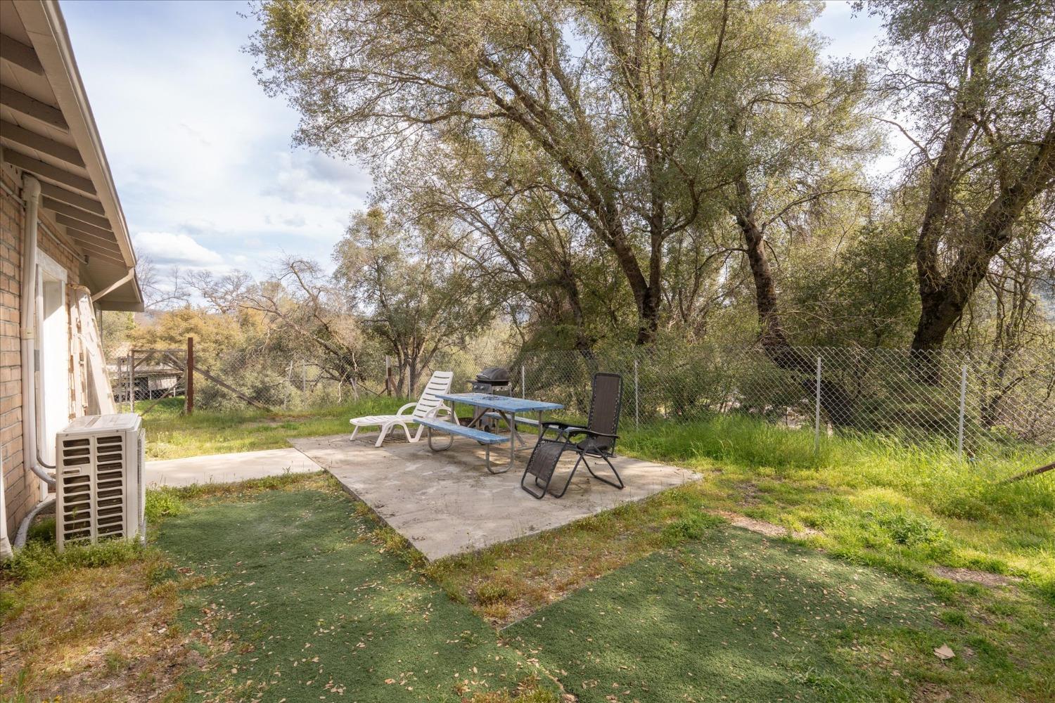 48994 Manzanita Road Oakhurst, CA 93644 - Photo 35 of 43 a view of a park with large trees
