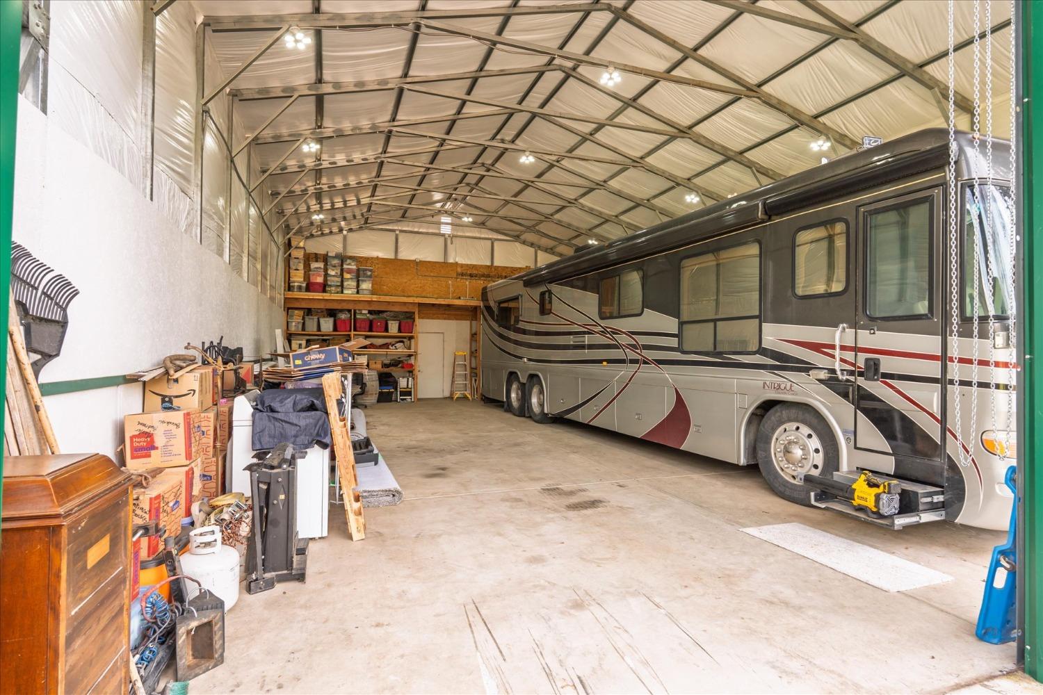 48994 Manzanita Road Oakhurst, CA 93644 - Photo 40 of 43 a view of parking garage with cars