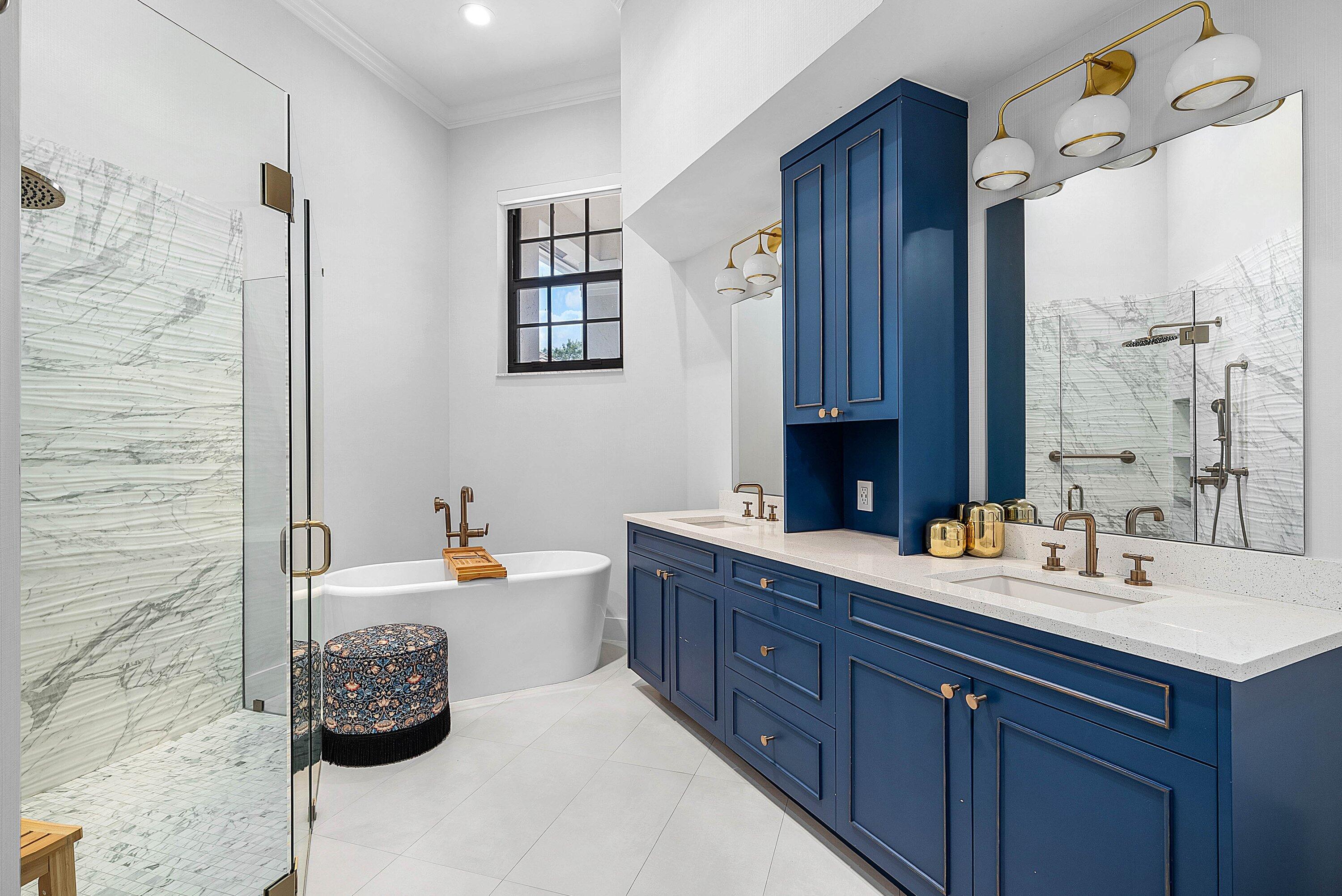 2413 Northwest 64th Street Boca Raton, FL 33496 - Photo 12 of 45 a bathroom with a double vanity sink mirror and tub