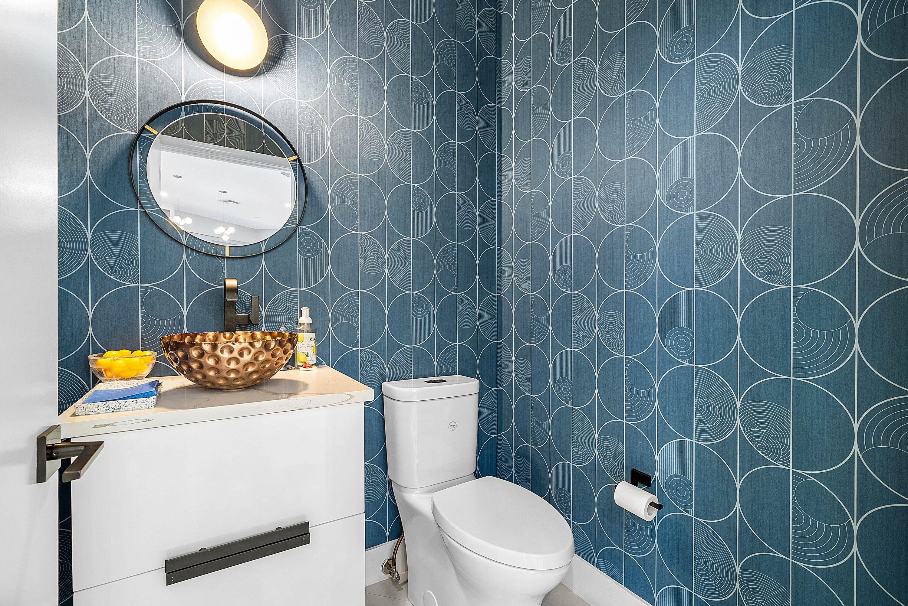 2413 Northwest 64th Street Boca Raton, FL 33496 - Photo 17 of 45 a bathroom with a sink mirror vanity and toilet