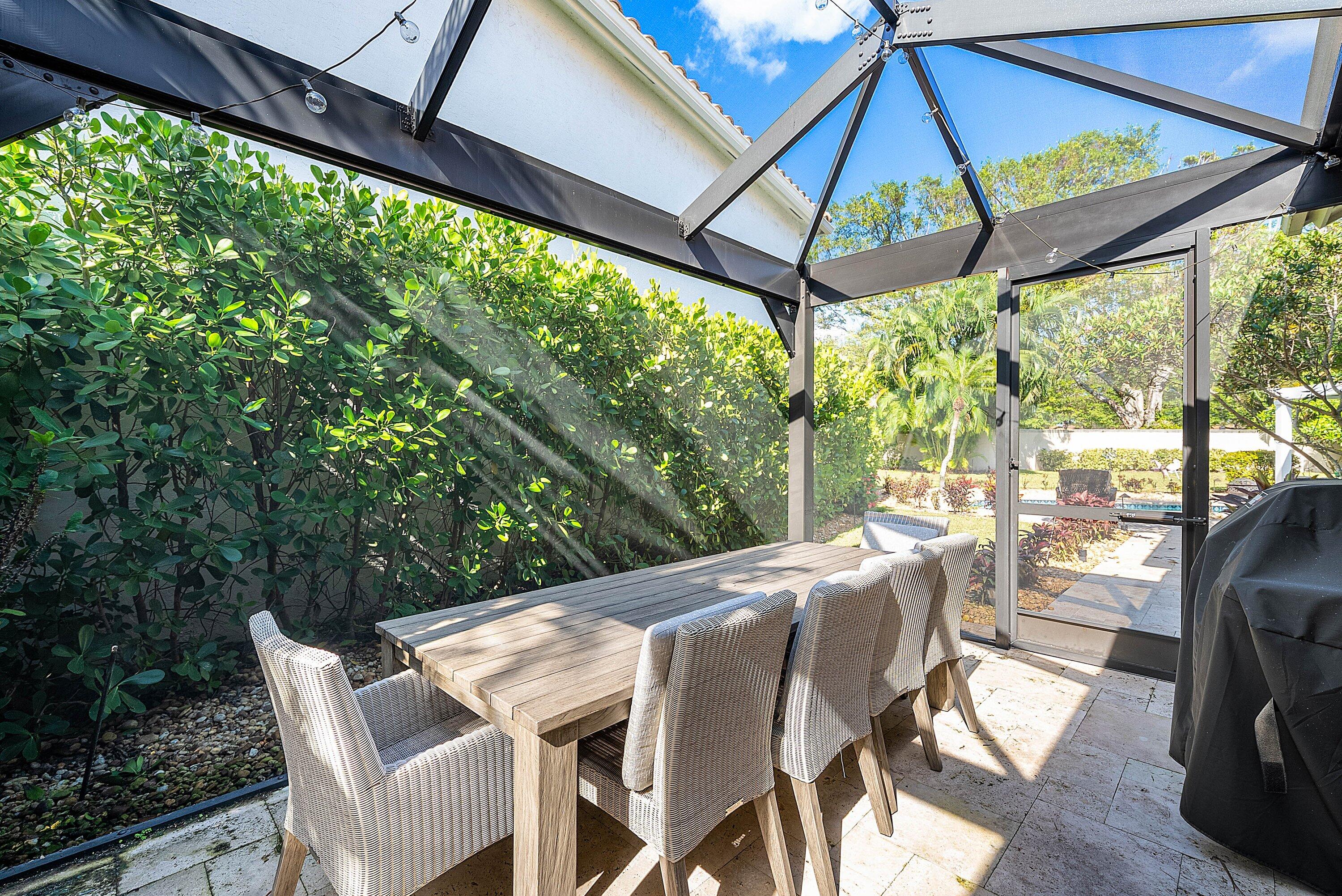 2413 Northwest 64th Street Boca Raton, FL 33496 - Photo 19 of 45 a view of an outdoor space with furniture and backyard