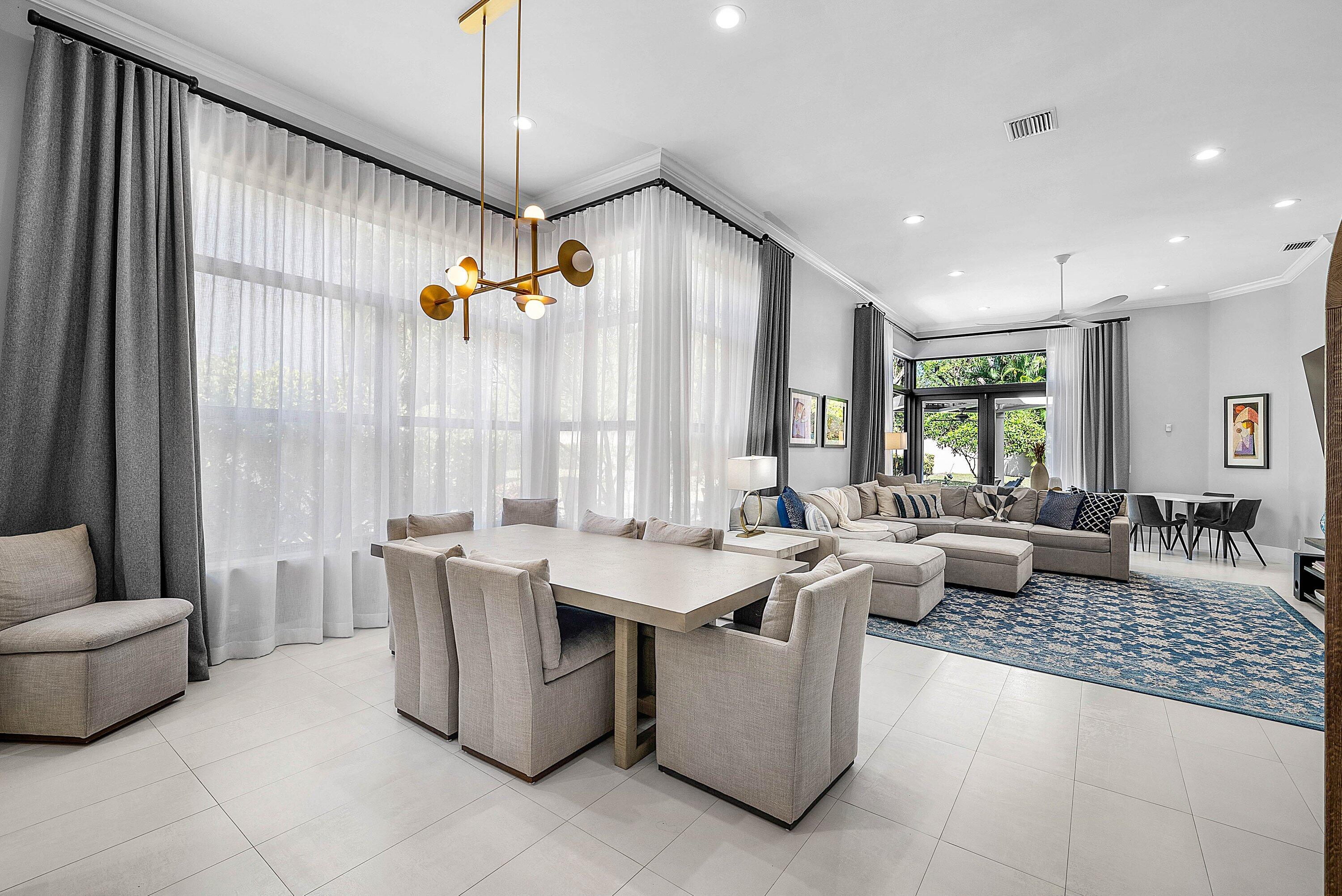 2413 Northwest 64th Street Boca Raton, FL 33496 - Photo 2 of 45 a room with furniture and window