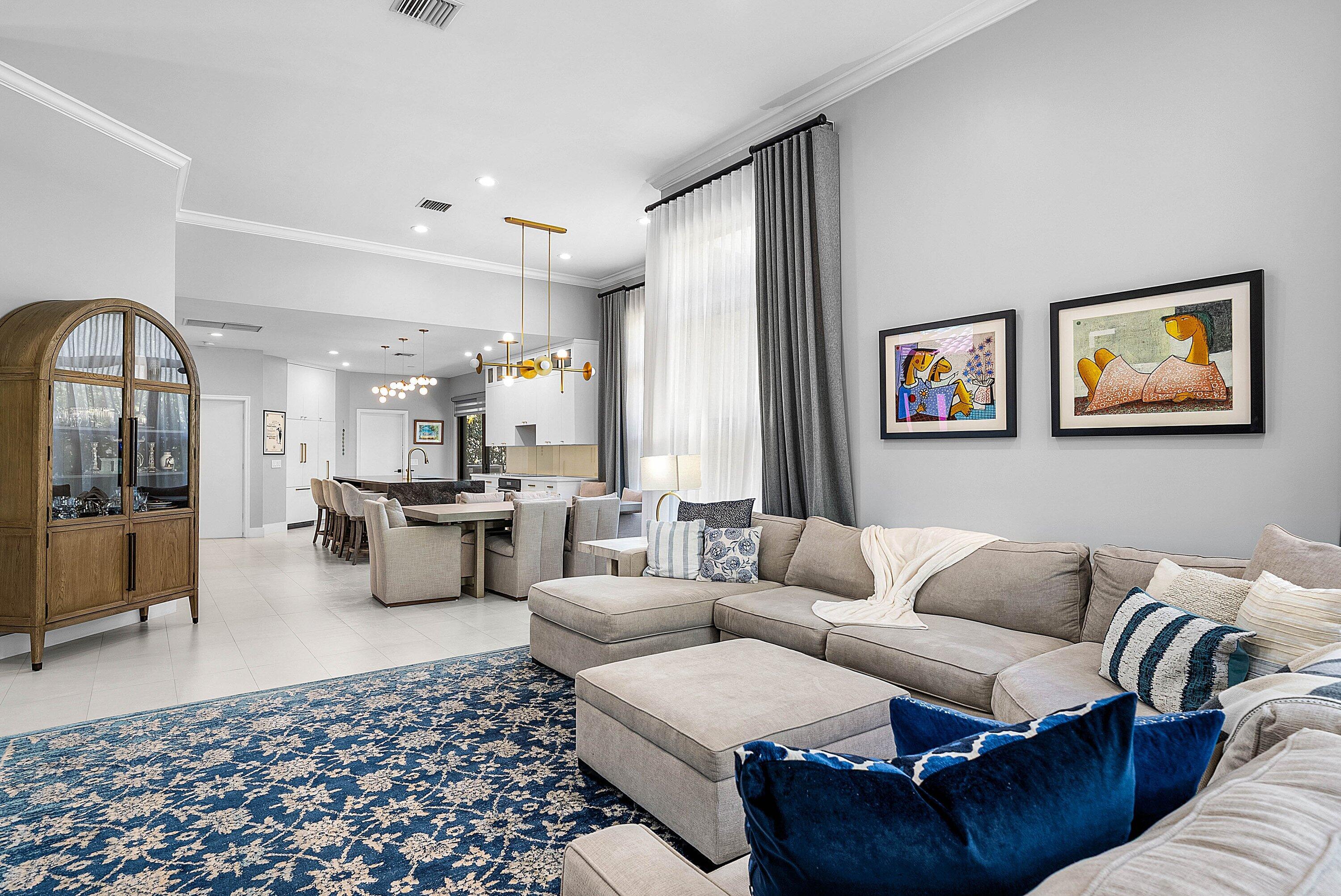 2413 Northwest 64th Street Boca Raton, FL 33496 - Photo 6 of 45 a living room with furniture and a rug