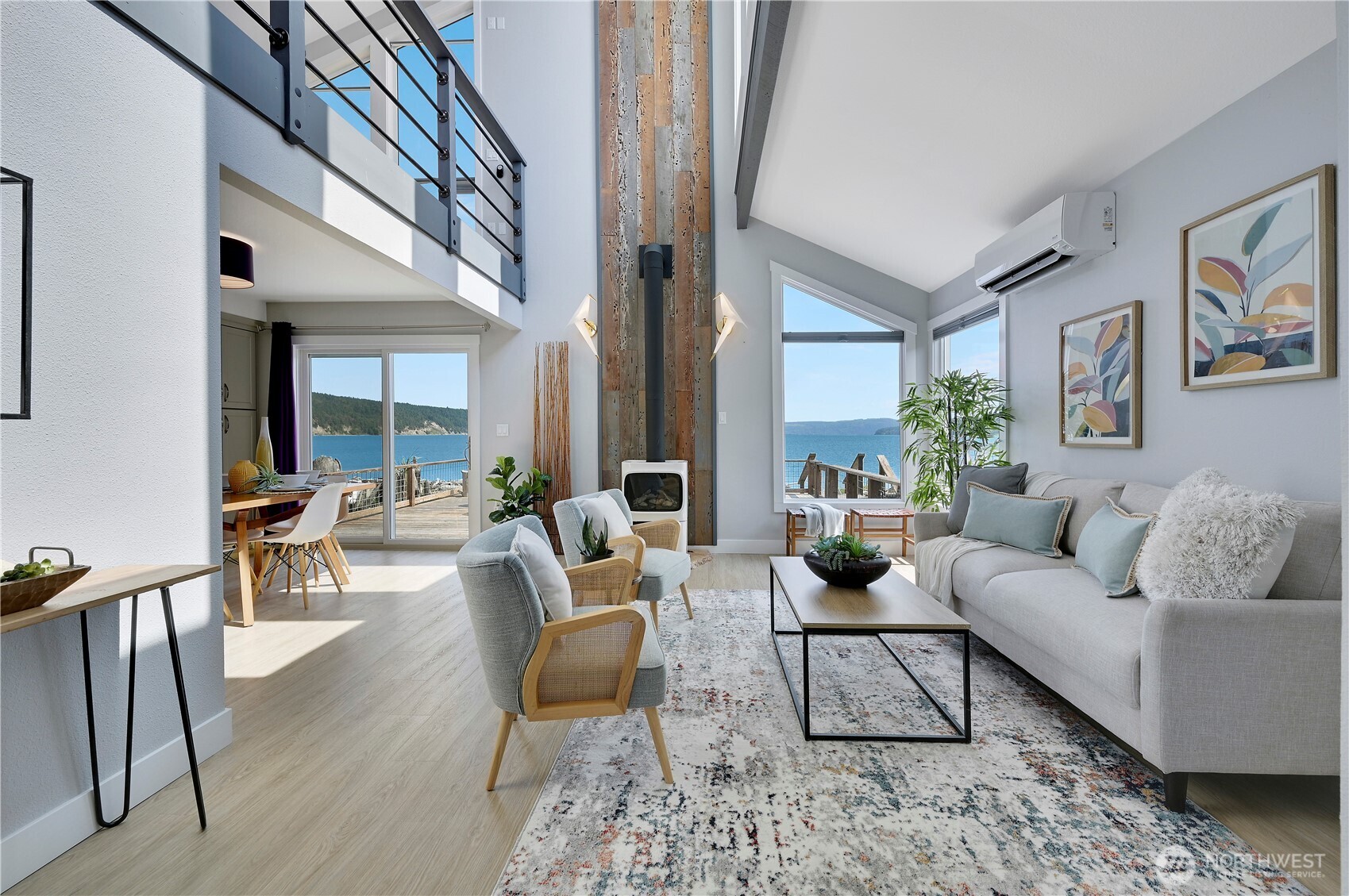 950 Beckett Point Road Port Townsend, WA 98368 - Photo 2 of 37 a living room with furniture and a large window