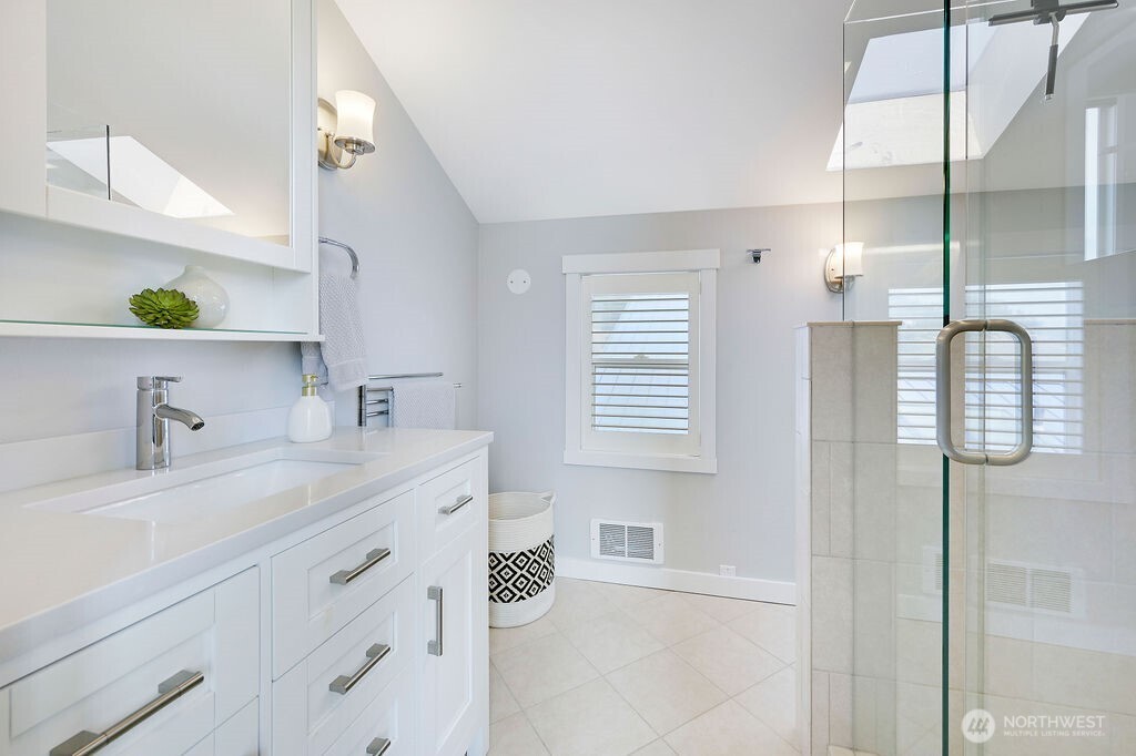950 Beckett Point Road Port Townsend, WA 98368 - Photo 24 of 37 a bathroom with a granite countertop sink mirror and double