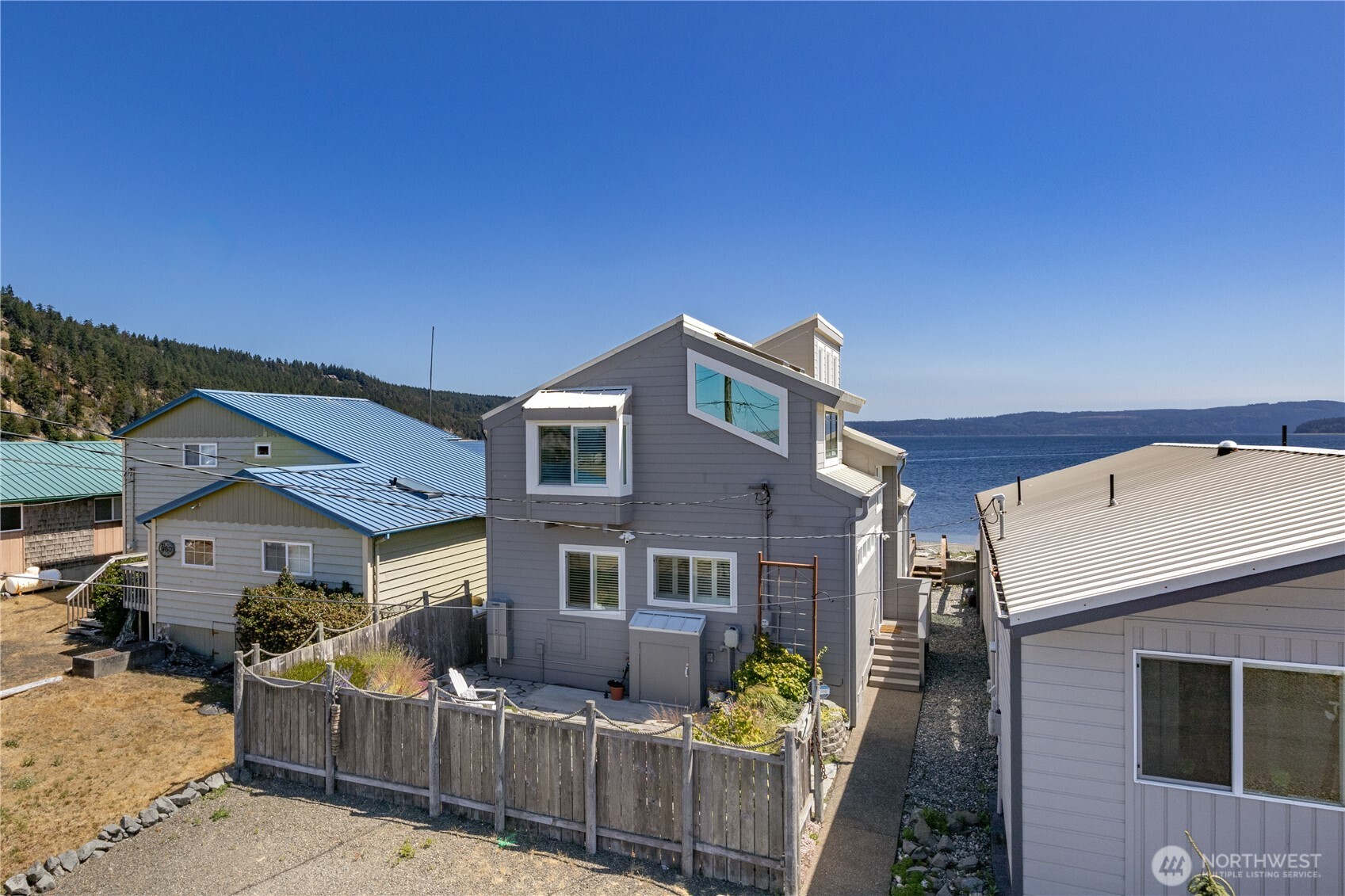 950 Beckett Point Road Port Townsend, WA 98368 - Photo 32 of 37 a front view of house with yard and car parked