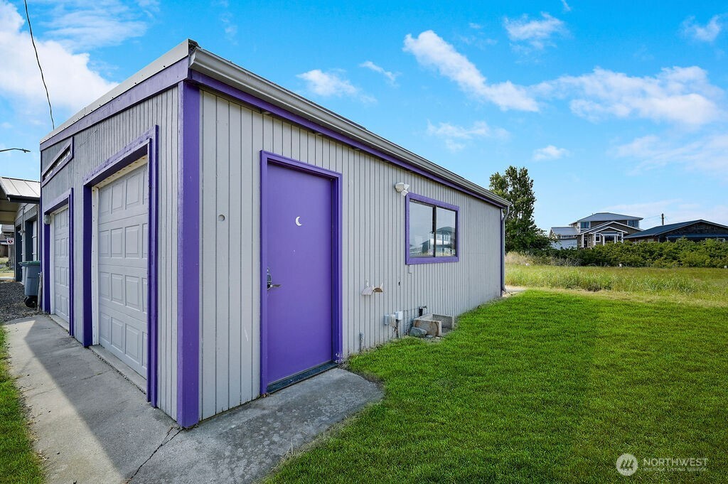 950 Beckett Point Road Port Townsend, WA 98368 - Photo 35 of 37 a front view of a house with garden