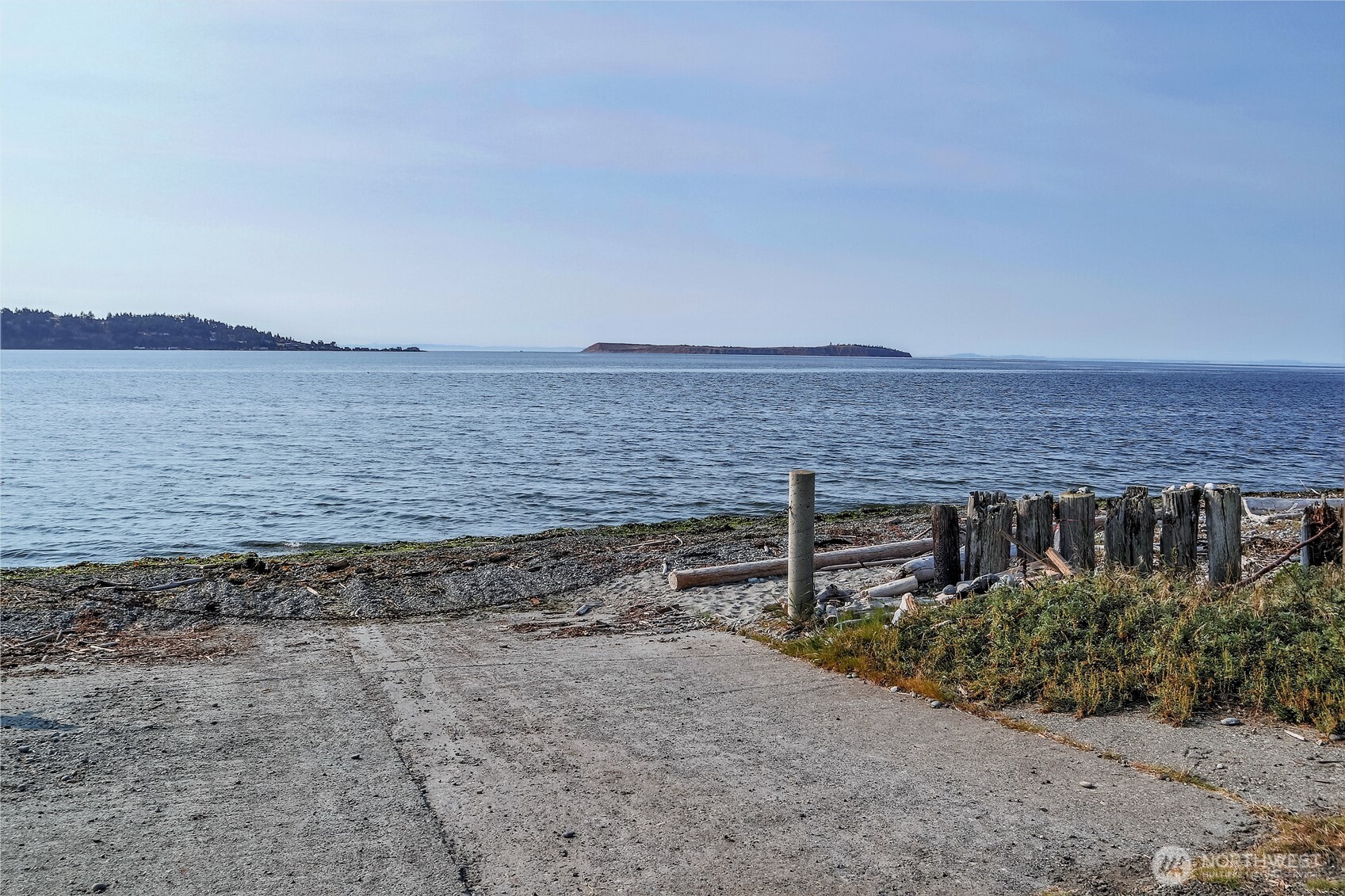 950 Beckett Point Road Port Townsend, WA 98368 - Photo 37 of 37 a view of a terrace with a garden