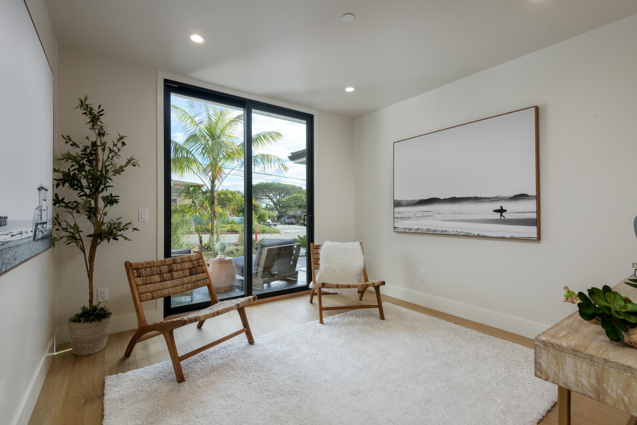 229 Mohawk Road Santa Barbara, CA 93109 - Photo 14 of 24 a living room with furniture and a potted plant