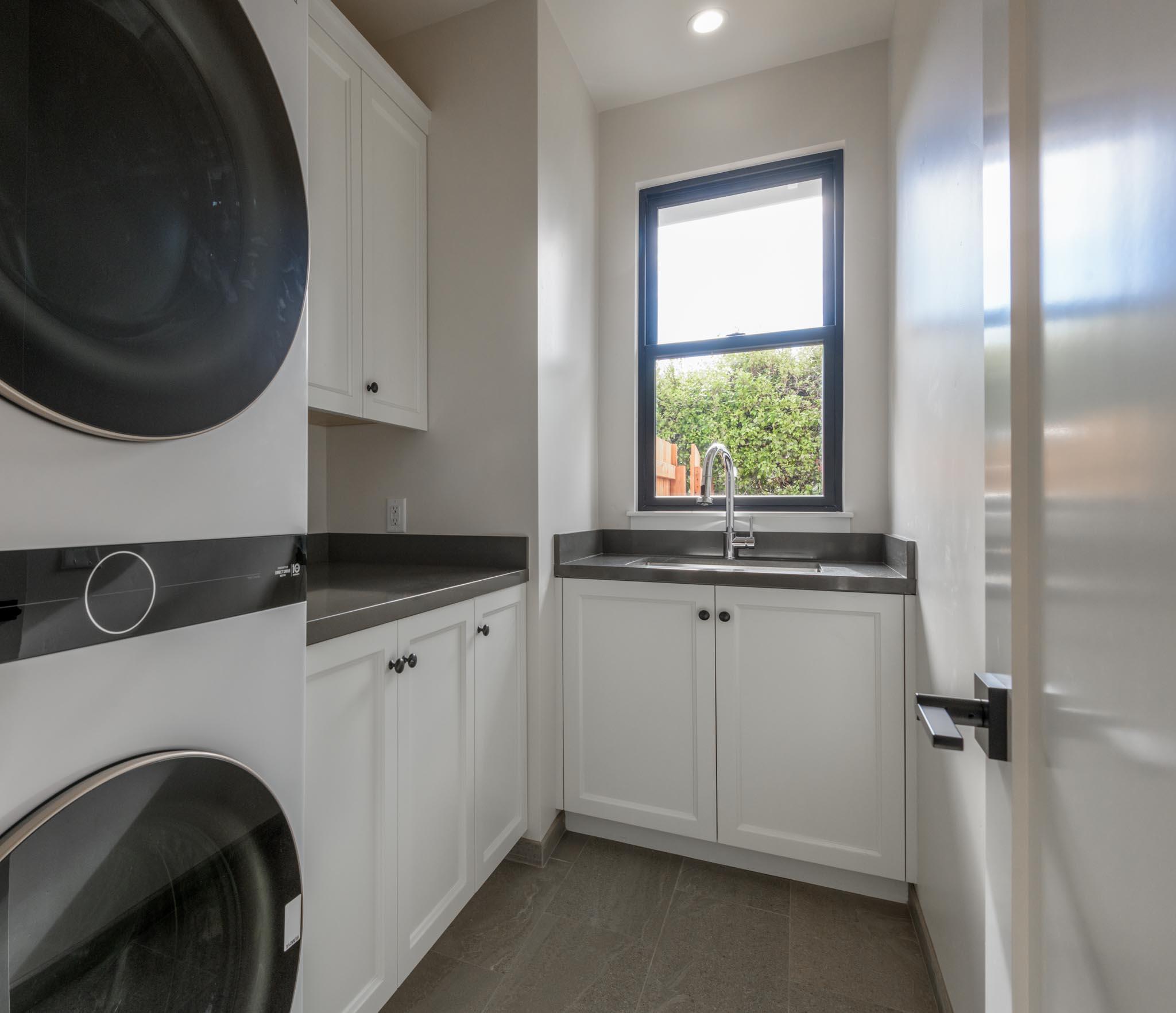 229 Mohawk Road Santa Barbara, CA 93109 - Photo 17 of 24 a kitchen with a sink and a mirror