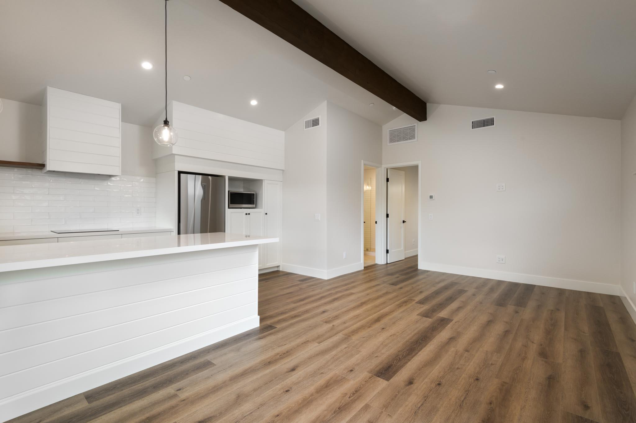 229 Mohawk Road Santa Barbara, CA 93109 - Photo 21 of 24 a view of a kitchen with wooden floor and a sink