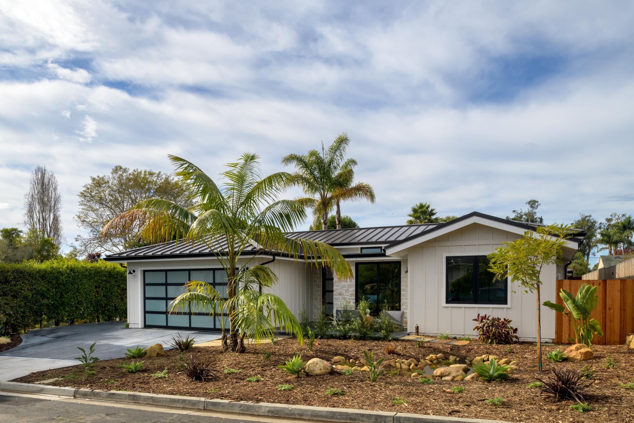 229 Mohawk Road Santa Barbara, CA 93109 - Photo 24 of 24 a view of a house with a yard and potted plants