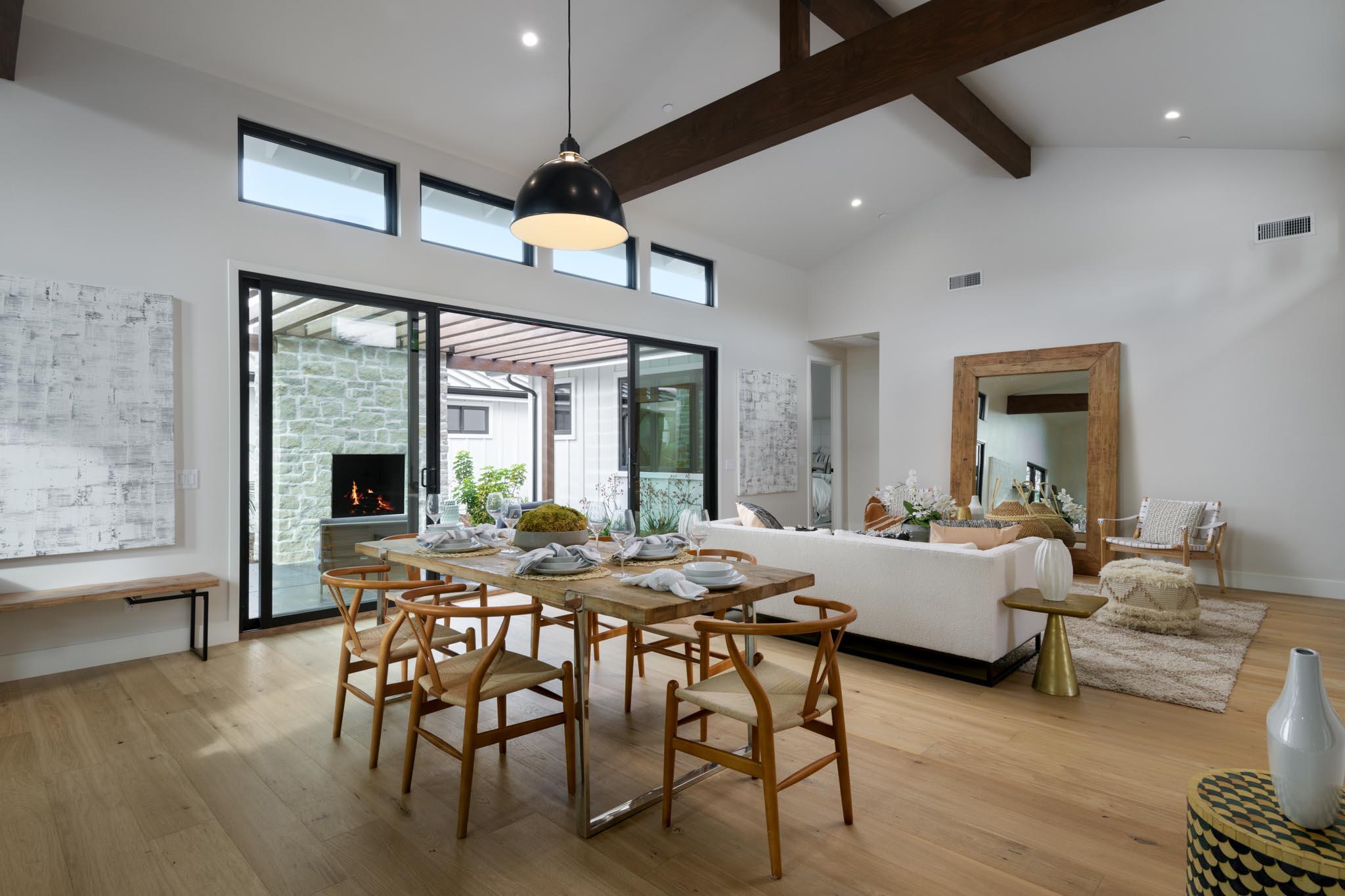 229 Mohawk Road Santa Barbara, CA 93109 - Photo 5 of 24 a view of a dining room with furniture wooden floor and chandelier