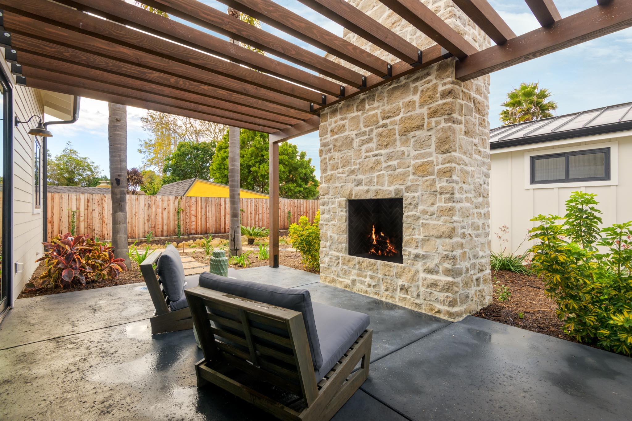 229 Mohawk Road Santa Barbara, CA 93109 - Photo 8 of 24 a outdoor living space with furniture and a fireplace
