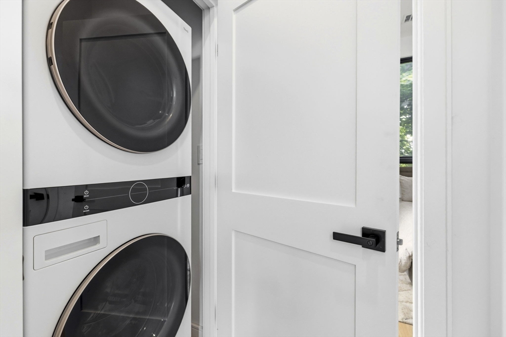 156 Albion Street, Unit R Somerville, MA 02144 - Photo 15 of 21 a utility room with dryer and washer