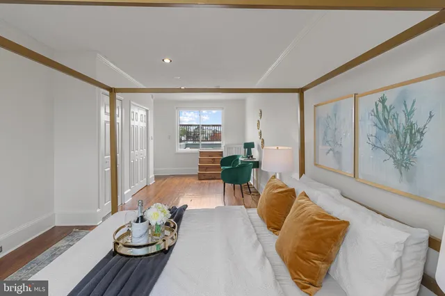 a view of a hallway with washer and dryer