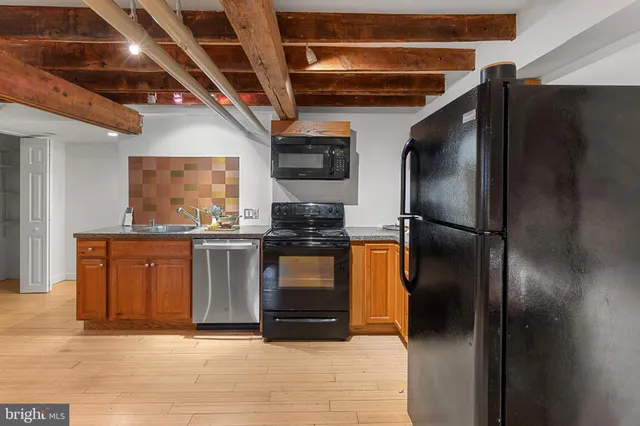 a view of a hallway with bathroom