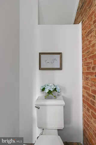 a view of wooden floor in an empty room