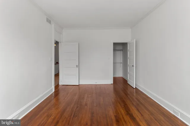 a bathroom with a toilet a sink and shower