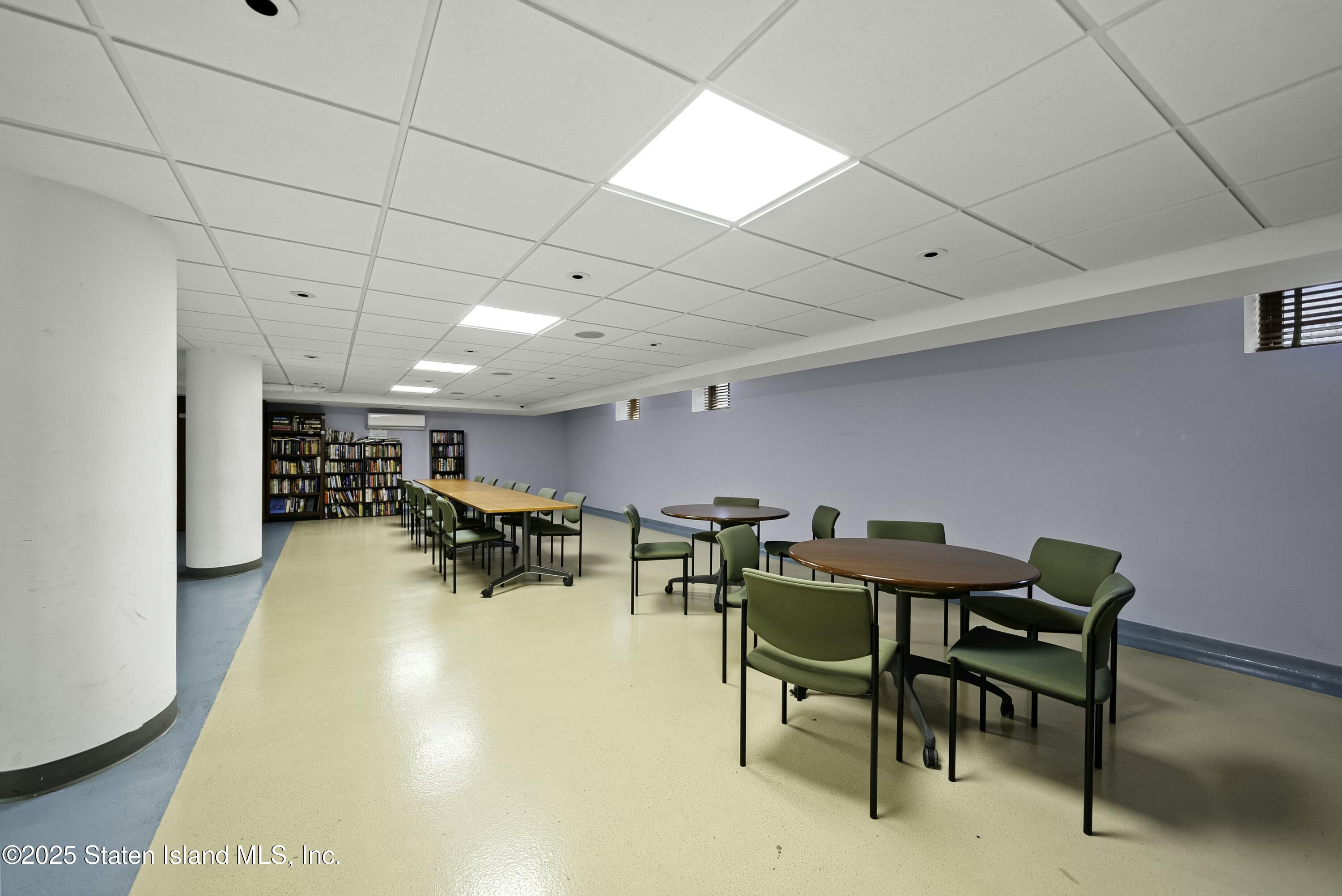 3105 Ave V, Unit 1F Brooklyn, NY 11229 - Photo 14 of 19 a view of a dining room with furniture and a chandelier