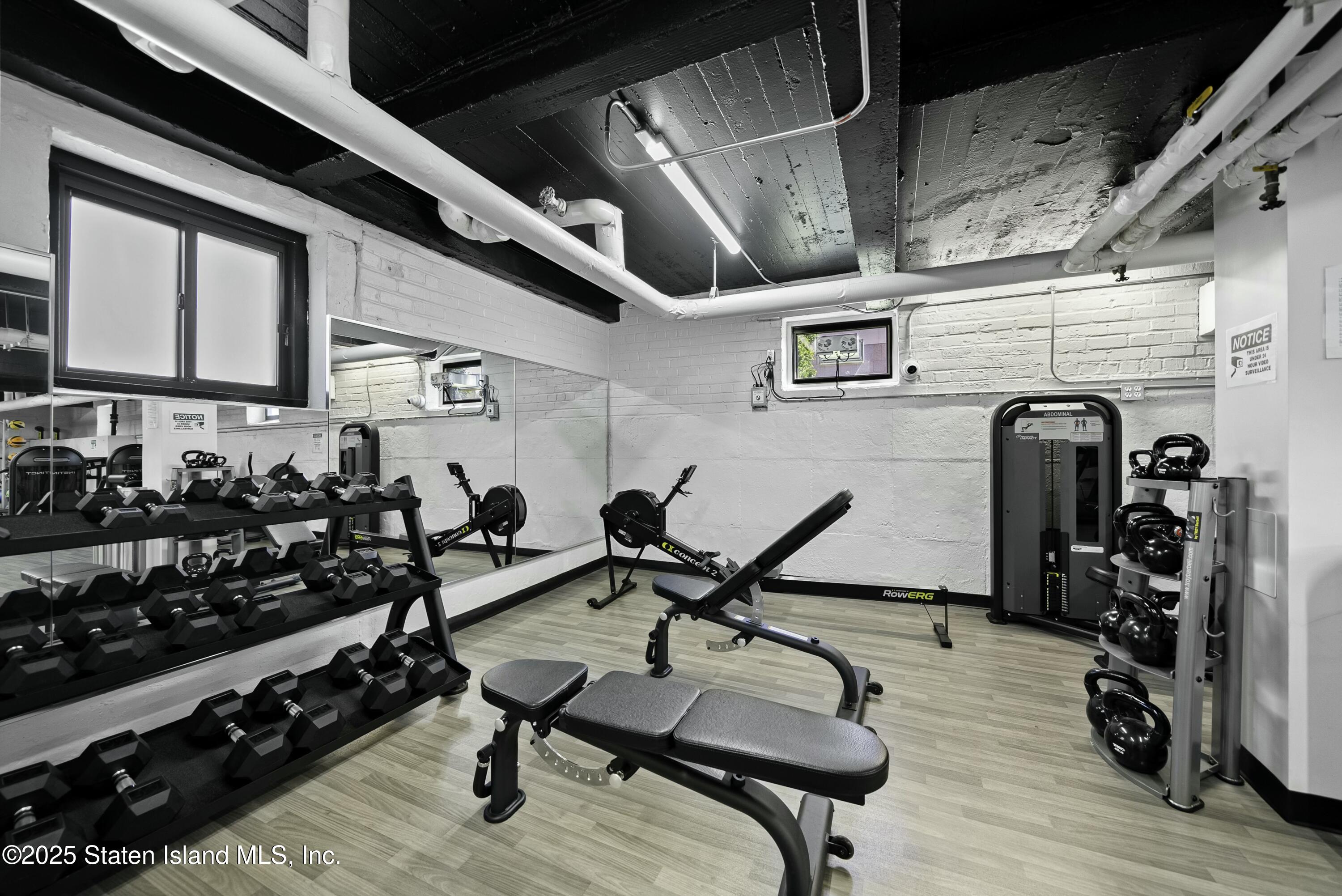 3105 Ave V, Unit 1F Brooklyn, NY 11229 - Photo 18 of 19 a view of a room with gym equipment