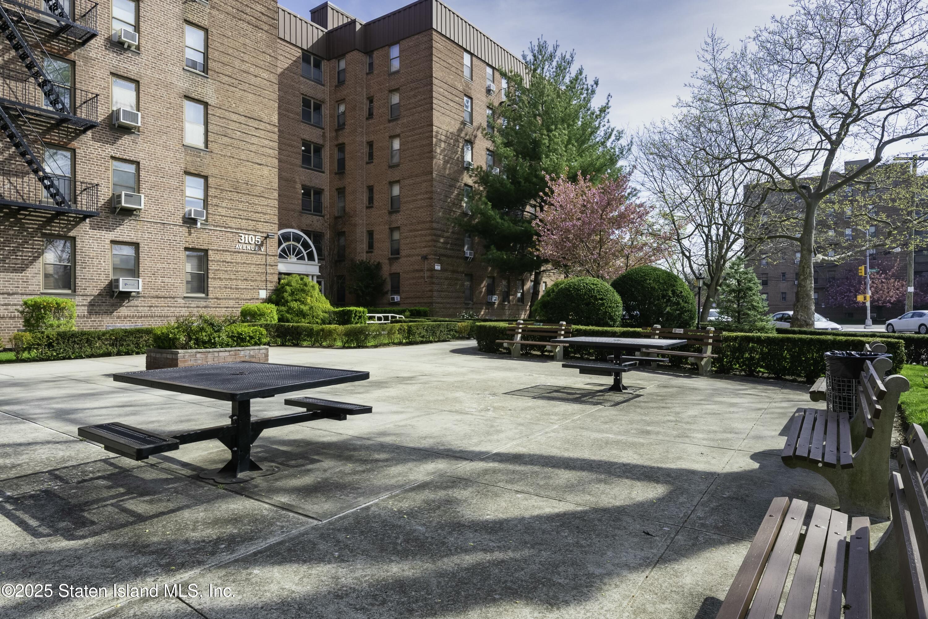 3105 Ave V, Unit 1F Brooklyn, NY 11229 - Photo 3 of 19 a view of a swimming pool with a lounge chairs