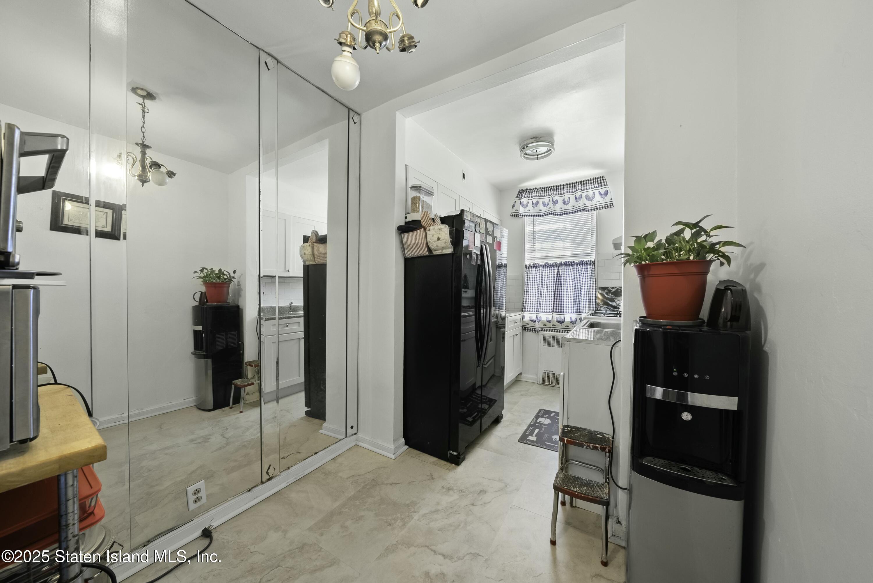 3105 Ave V, Unit 1F Brooklyn, NY 11229 - Photo 7 of 19 a kitchen with a refrigerator and a stove top oven