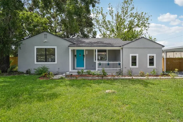 front view of a house with a yard