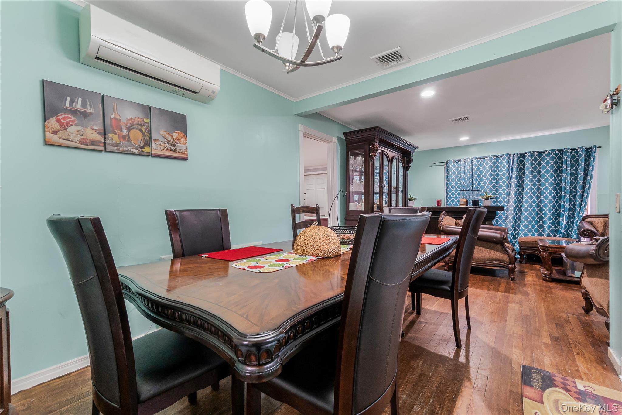 68 Riverdale Road Valley Stream, NY 11581 - Photo 3 of 19 a view of a dining room with furniture