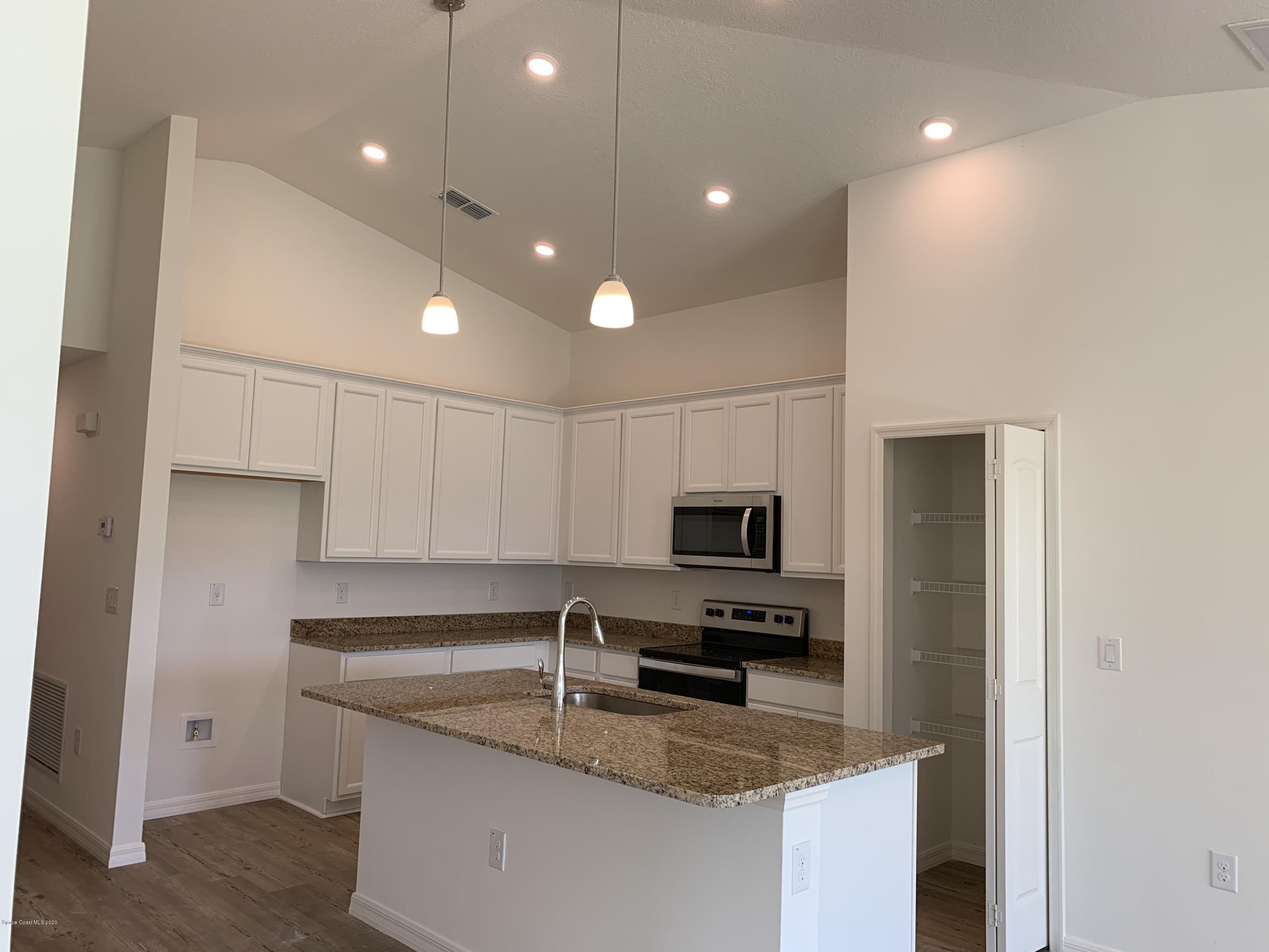 604 Corbin Circle Southwest Palm Bay, FL 32908 - Photo 2 of 29 Acosta B