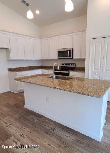 604 Corbin Circle Southwest Palm Bay, FL 32908 - Photo 23 of 29 Lot 112B Kitchen Island