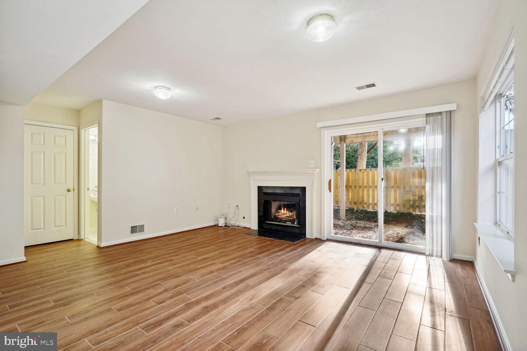 2817 Roesh Way Vienna, VA 22181 - Photo 21 of 30 Nice LVP flooring in family room downstairs