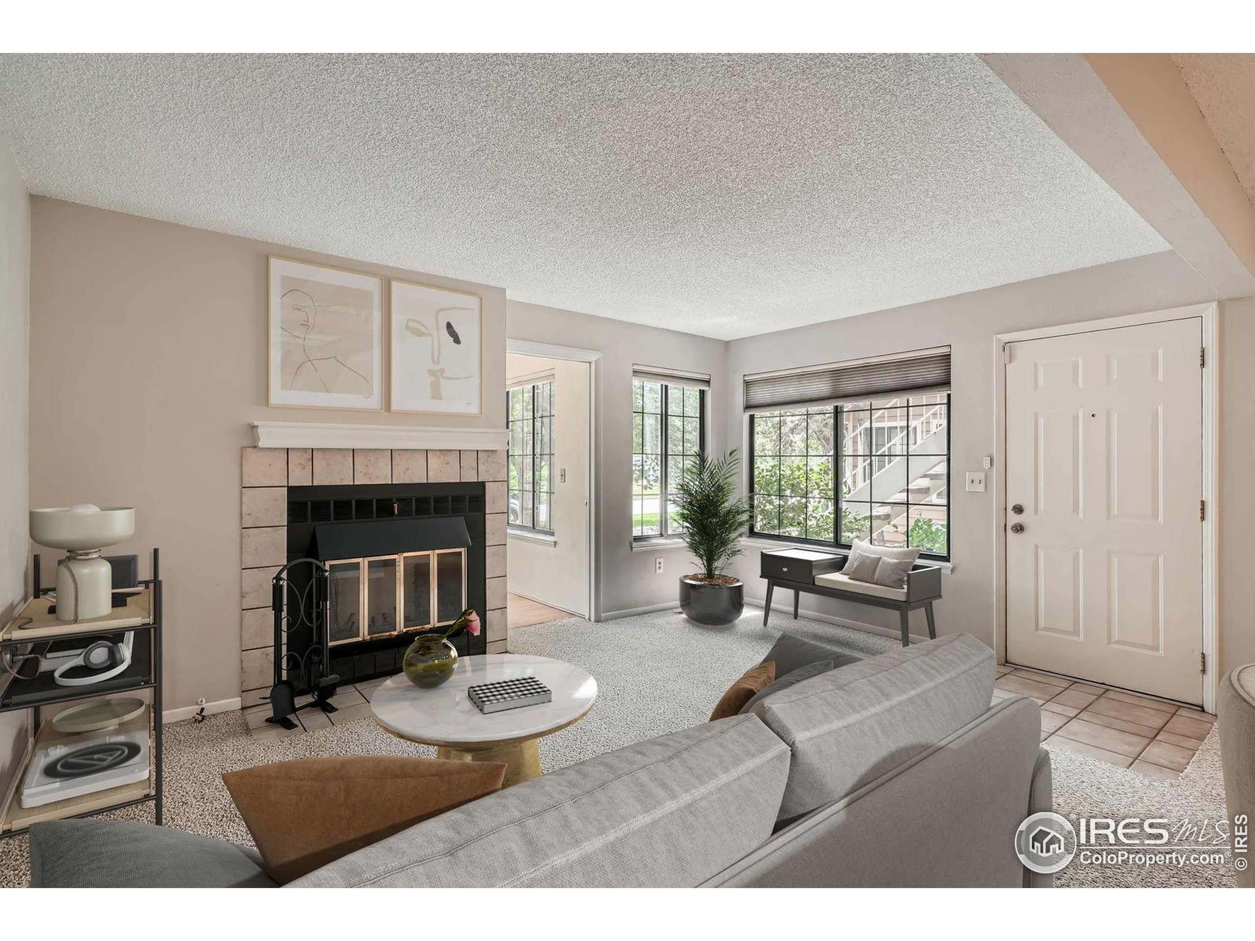 4767 White Rock Circle, Unit D Boulder, CO 80301 - Photo 11 of 41 a living room with furniture and a fireplace