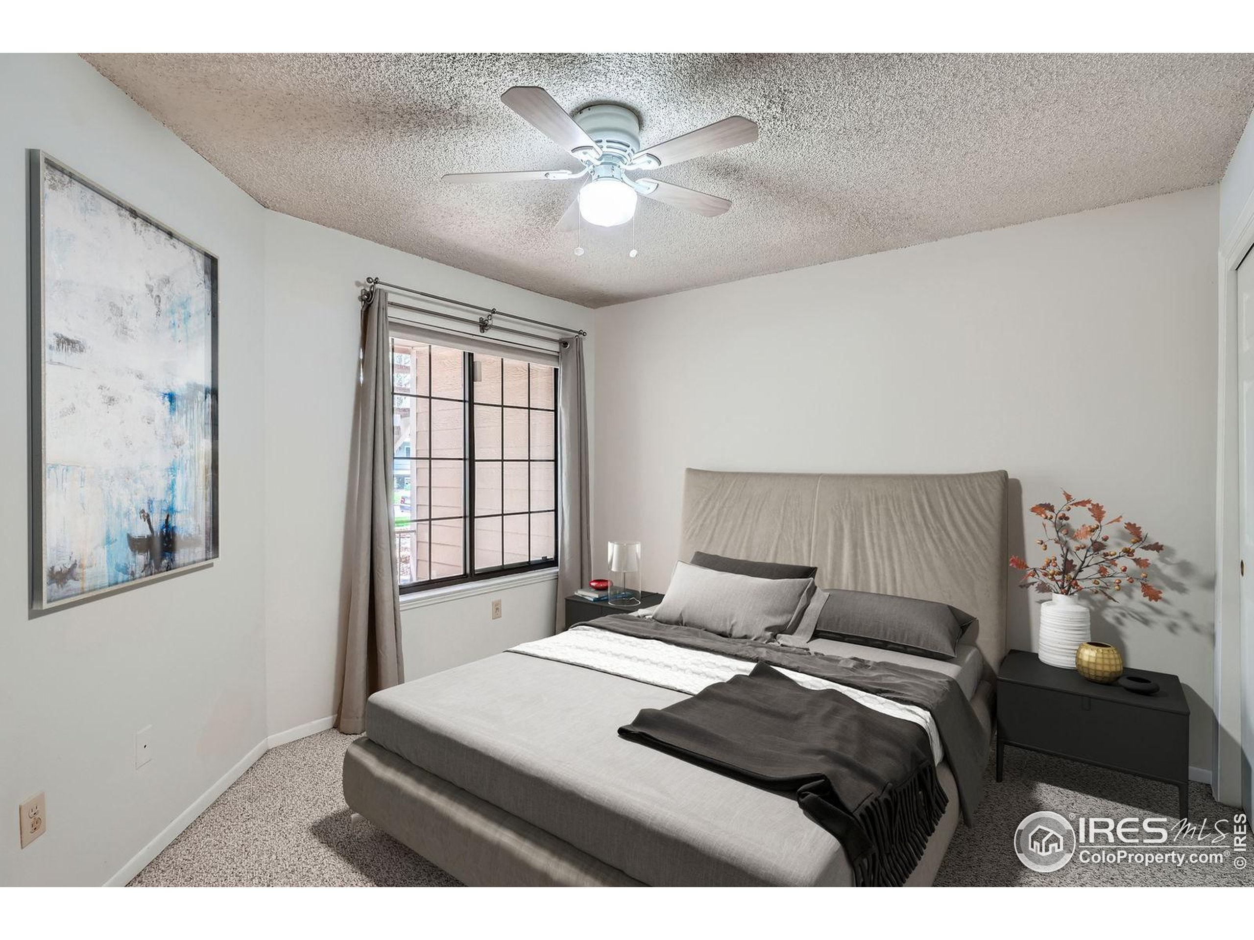 4767 White Rock Circle, Unit D Boulder, CO 80301 - Photo 23 of 41 a bedroom with a bed and window