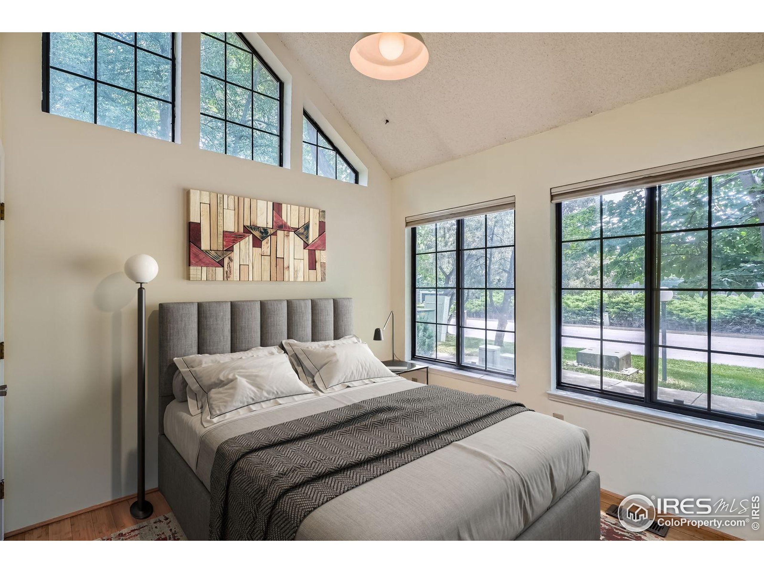 4767 White Rock Circle, Unit D Boulder, CO 80301 - Photo 26 of 41 a bedroom with a bed and a window