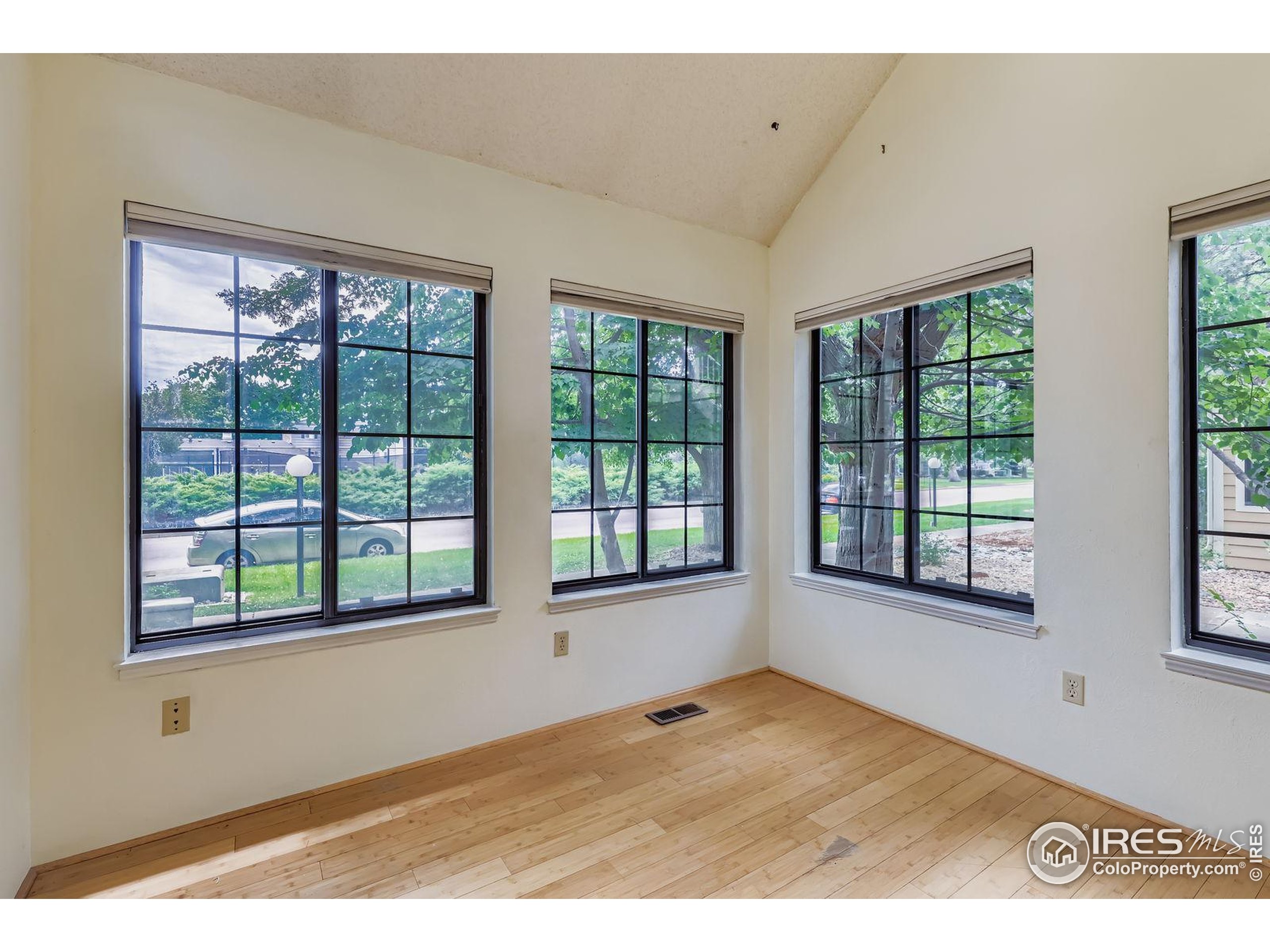 4767 White Rock Circle, Unit D Boulder, CO 80301 - Photo 28 of 41 a view of an empty room with a window
