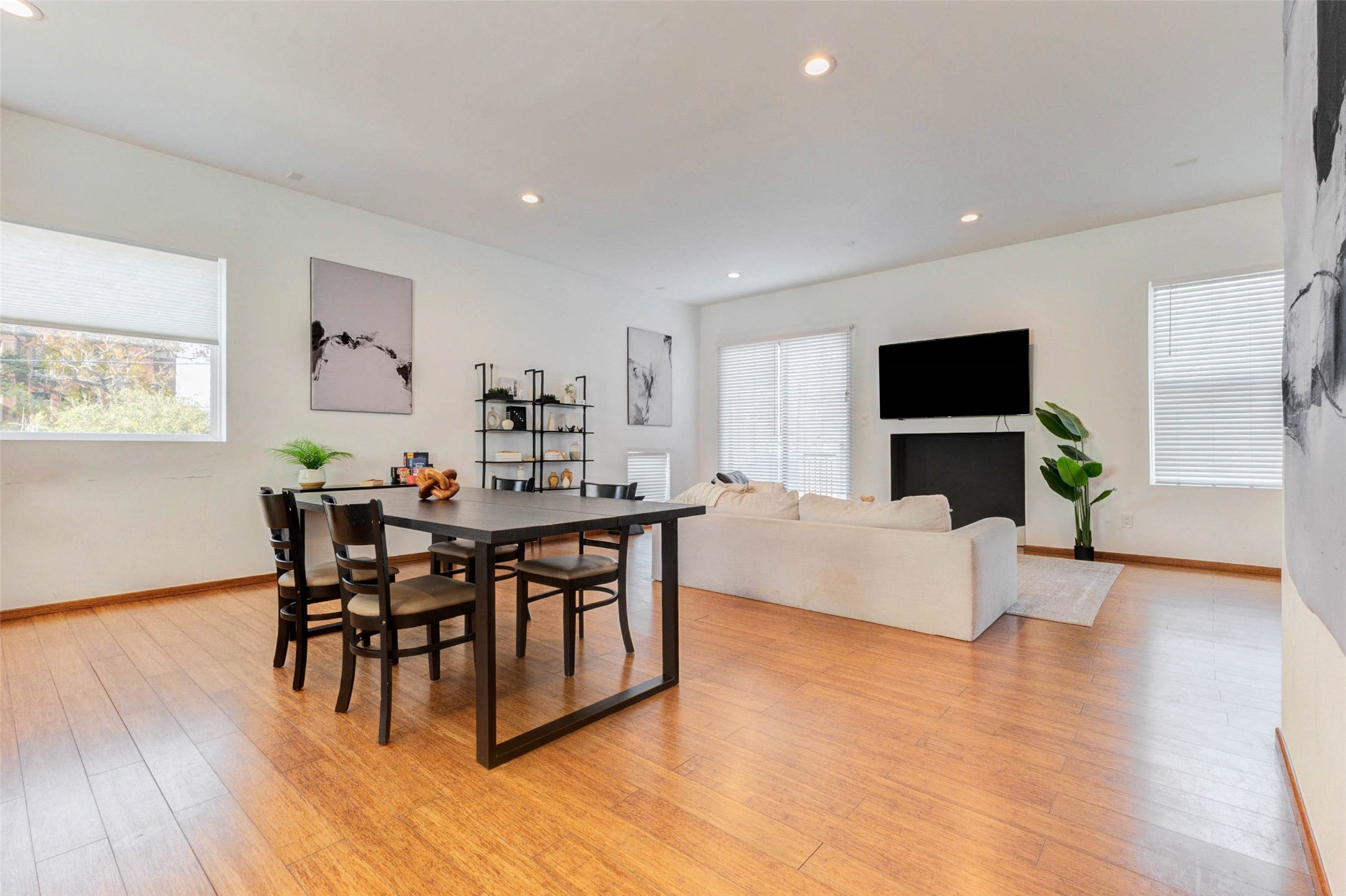 4115 Chartres Street Houston, TX 77004 - Photo 14 of 50 a living room with furniture and a wooden floor