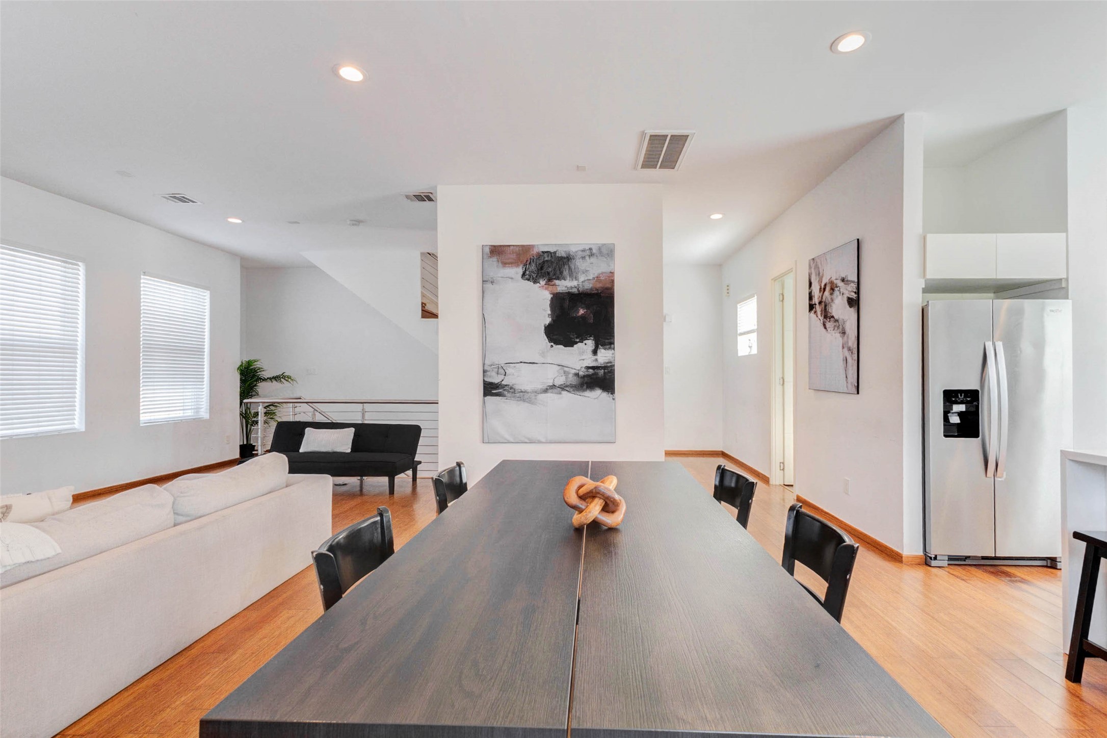 4115 Chartres Street Houston, TX 77004 - Photo 16 of 50 a living room with furniture and a flat screen tv