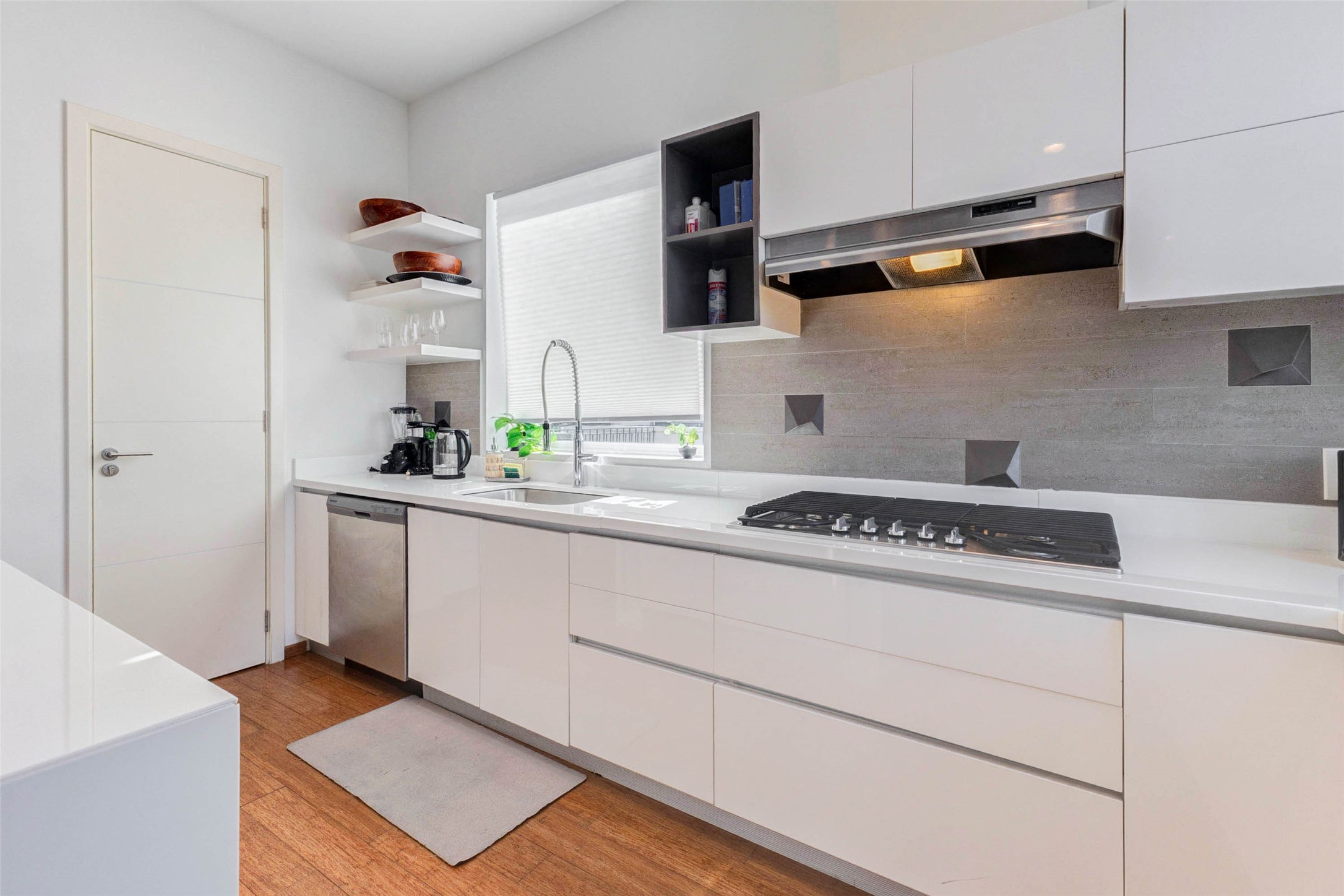 4115 Chartres Street Houston, TX 77004 - Photo 20 of 50 a kitchen with a stove and a refrigerator
