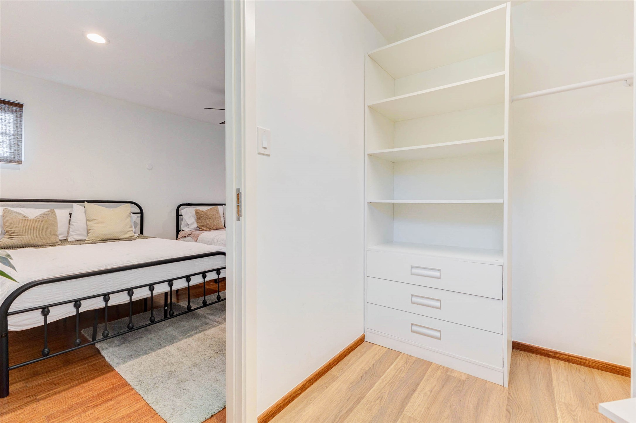 4115 Chartres Street Houston, TX 77004 - Photo 27 of 50 a view of a bedroom with two bed and a window