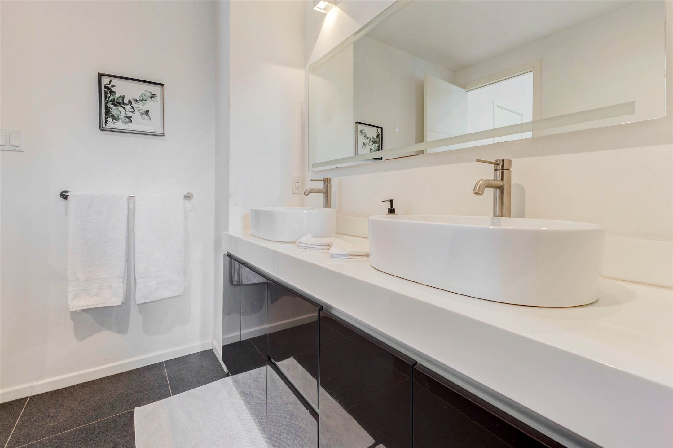 4115 Chartres Street Houston, TX 77004 - Photo 35 of 50 a bathroom with a sink and a mirror