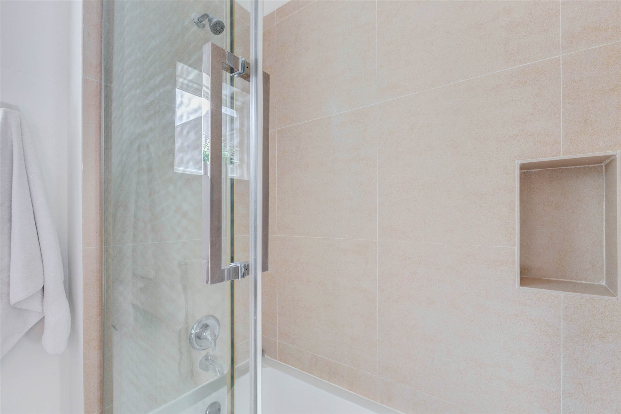 4115 Chartres Street Houston, TX 77004 - Photo 41 of 50 a bathroom with a glass shower door