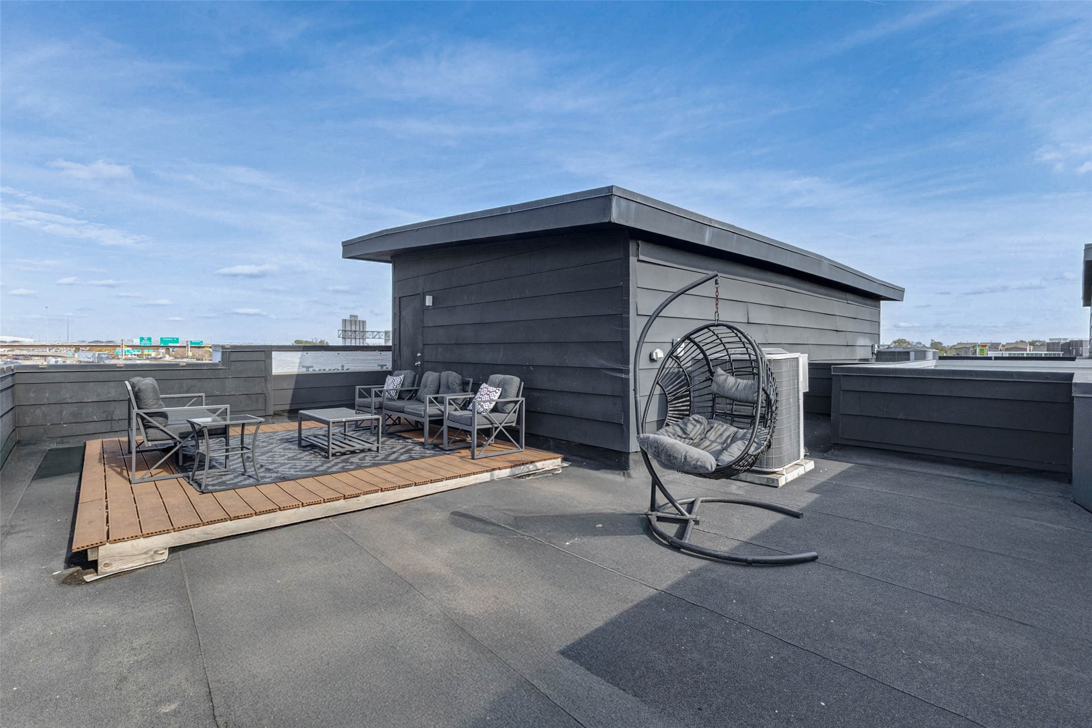 4115 Chartres Street Houston, TX 77004 - Photo 47 of 50 a backyard of a house with barbeque oven and a table and chairs