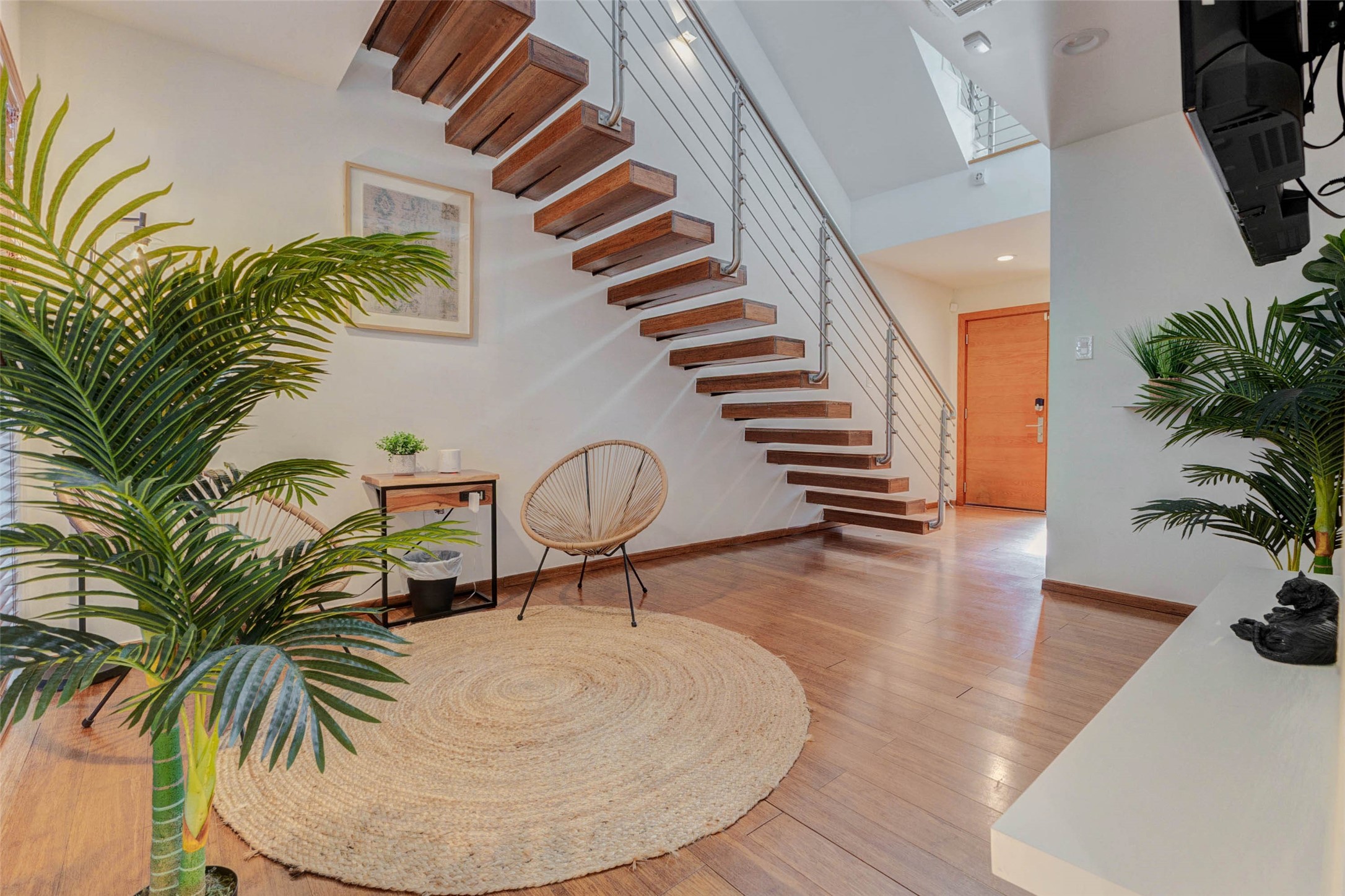4115 Chartres Street Houston, TX 77004 - Photo 9 of 50 a view of entryway and hall with wooden floor
