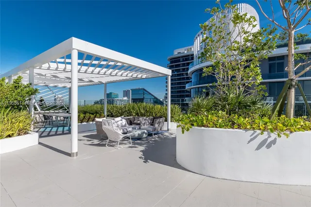 a view of outdoor space with lounge chair