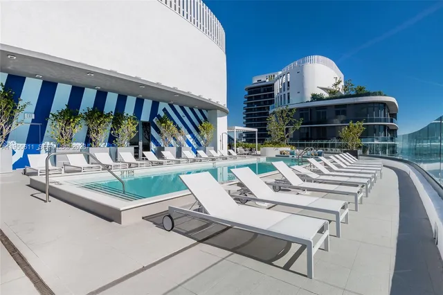 a view of a kitchen with kitchen island and the counter top